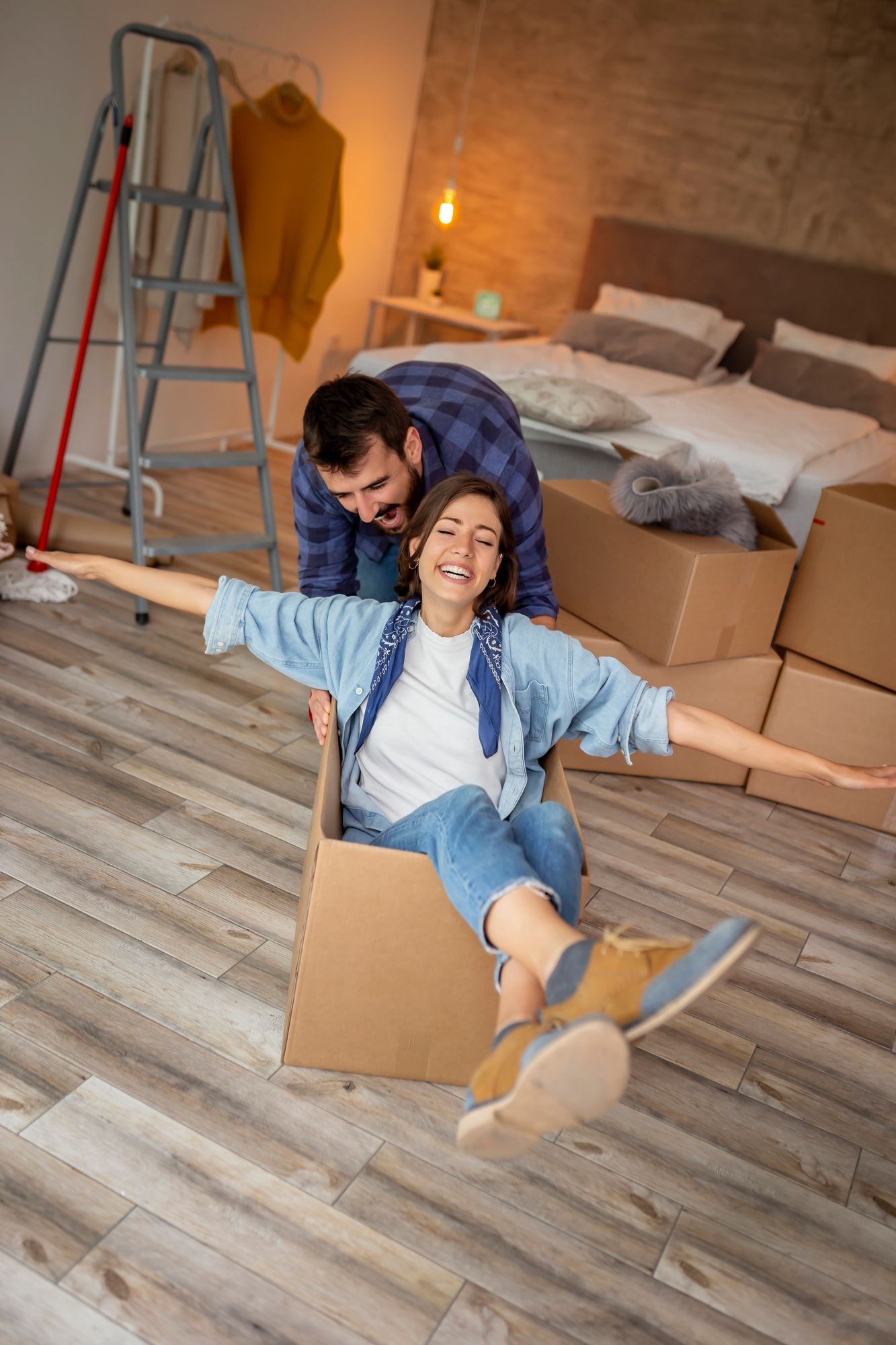 Couple in love moving in a new home